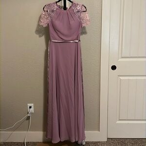 Size 2 like new the dress has a ribbon not the one in jjhouse picture